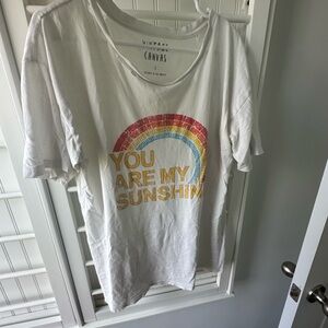 Vintage Canvas Graphic Tee with Happy Rainbow Print